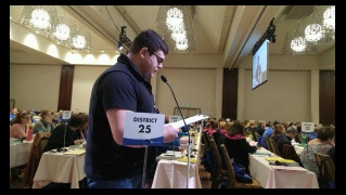 Troy Cluff at Microphone at AMPA